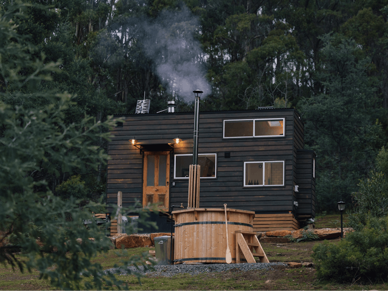 Our Ceder tiny house has a wood fired hot tub