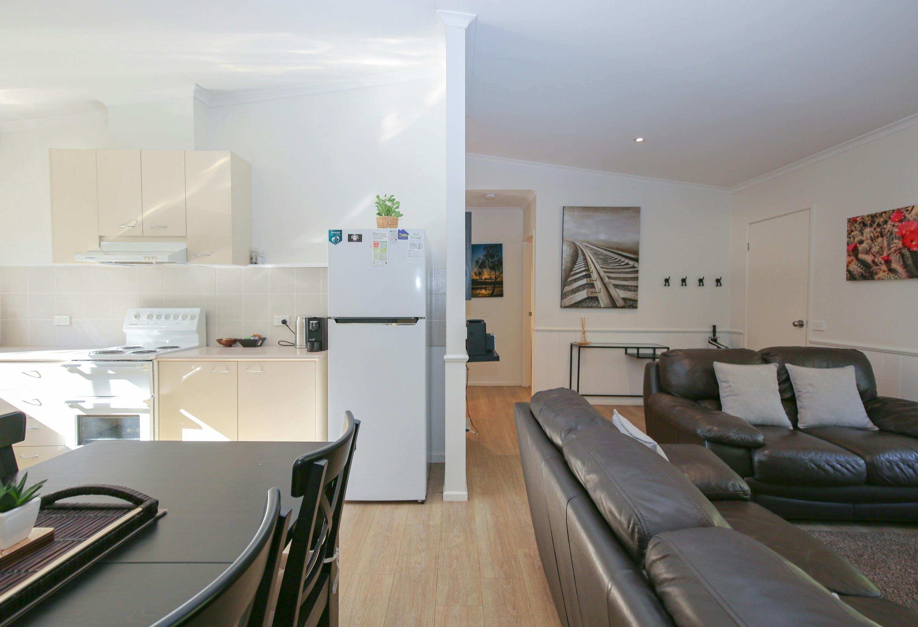 Kitchen, dining and lounge at Unit One