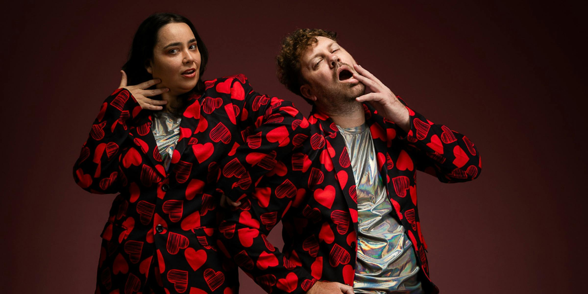 Taylor Edwards and Chris Martin, looking hot in matching blasers