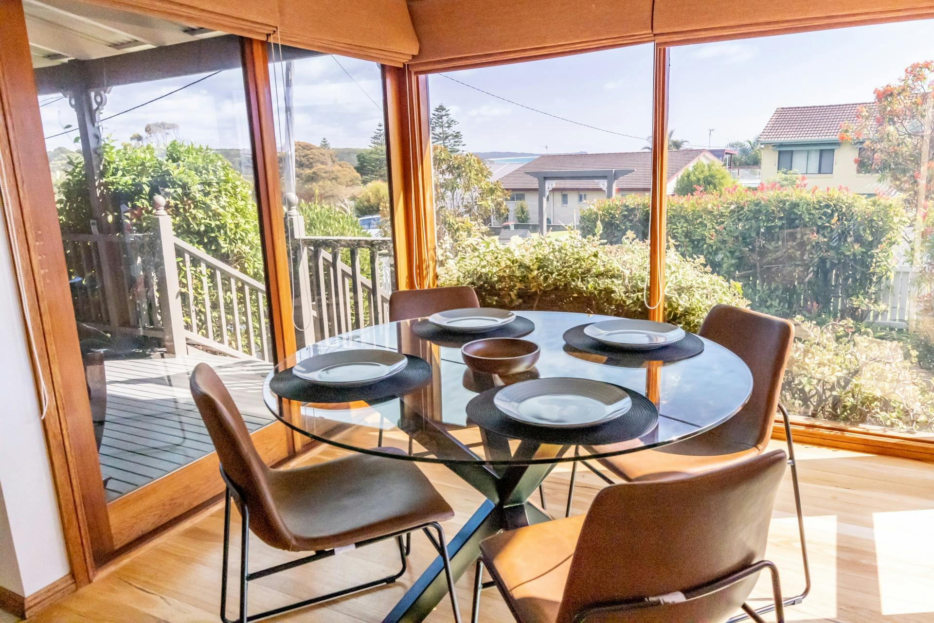 Sunny breakfast nook looks over the front garden, front deck and distant views. Enjoy!