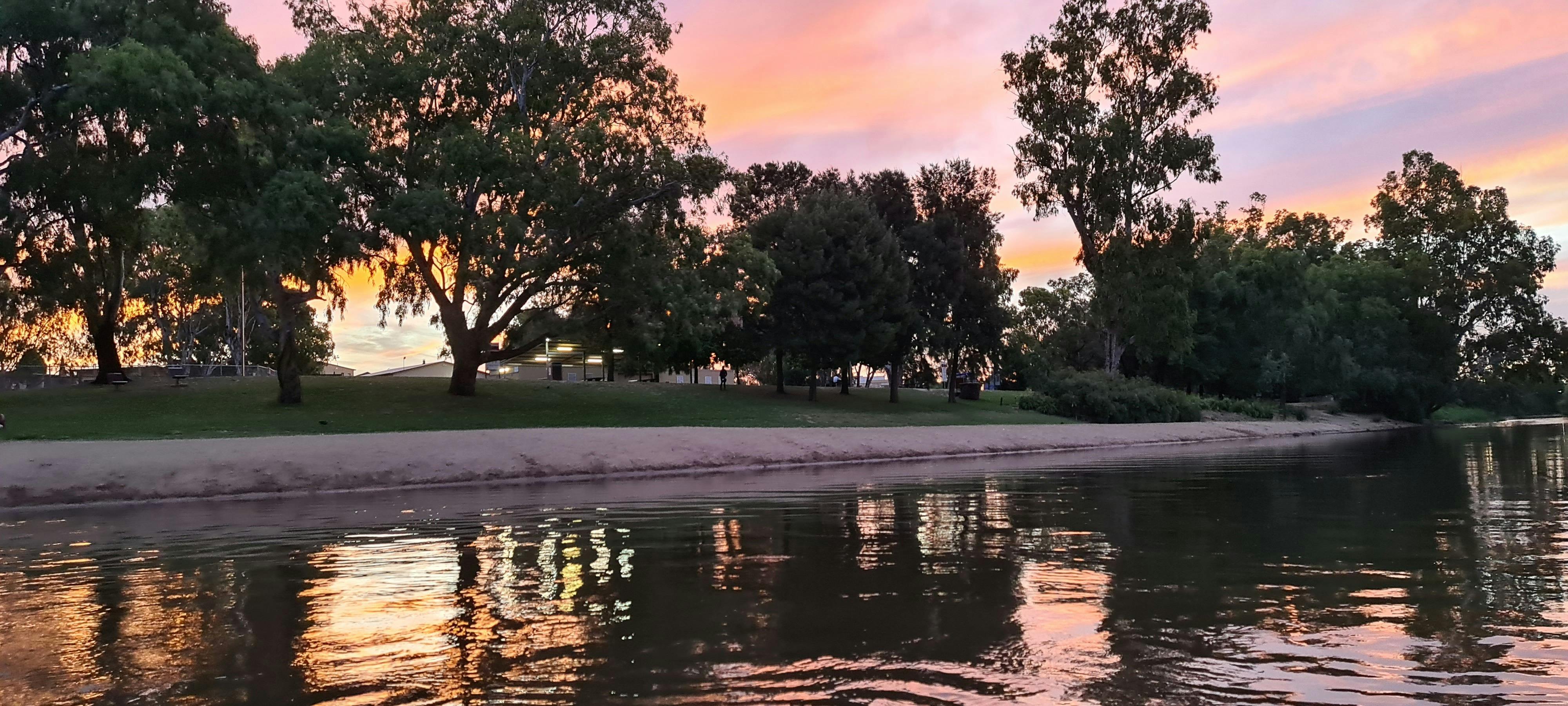 Sunset colours as kayaking past Wagga Beach