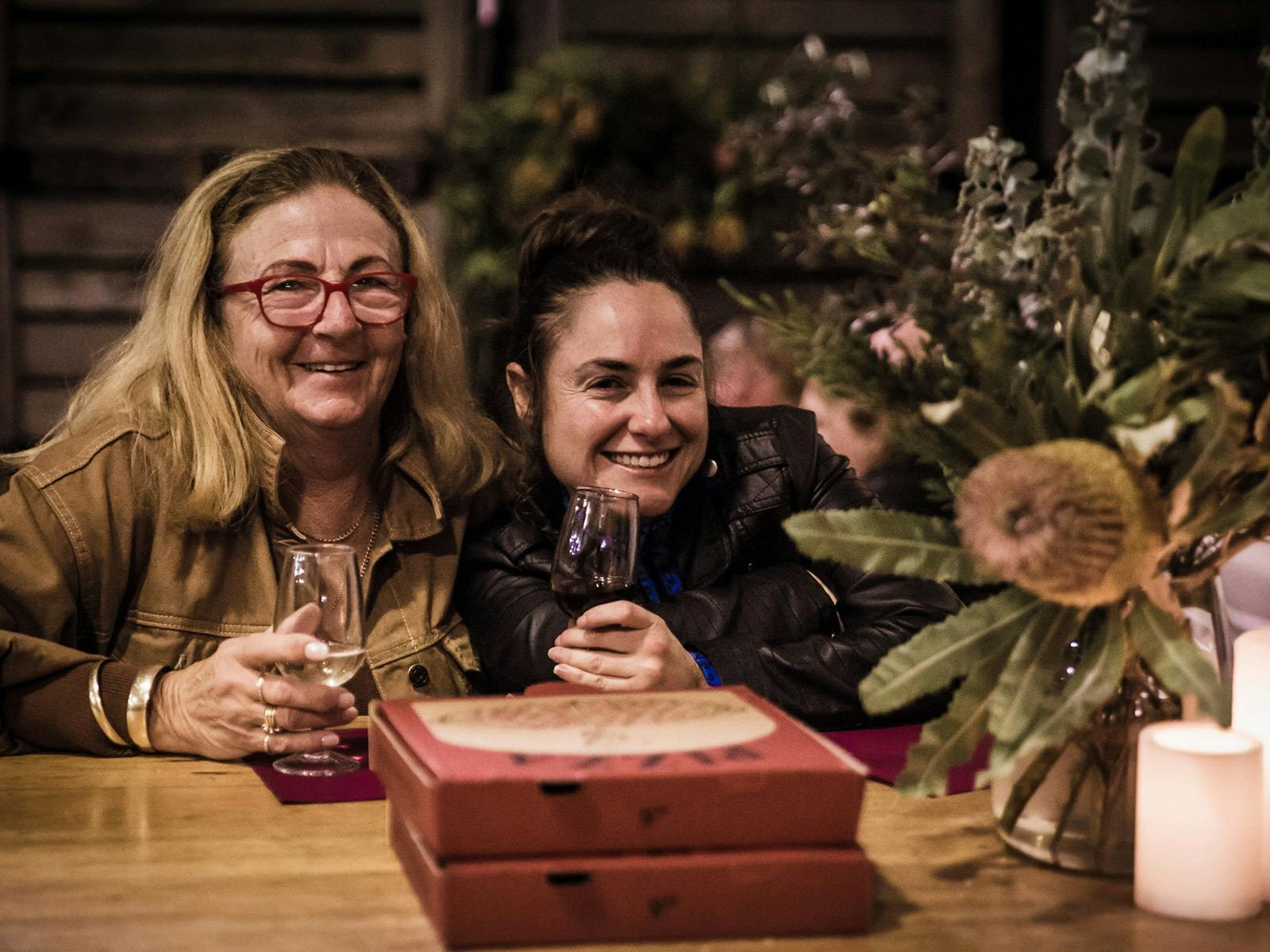 Two ladies enjoy a Zema Estate Event