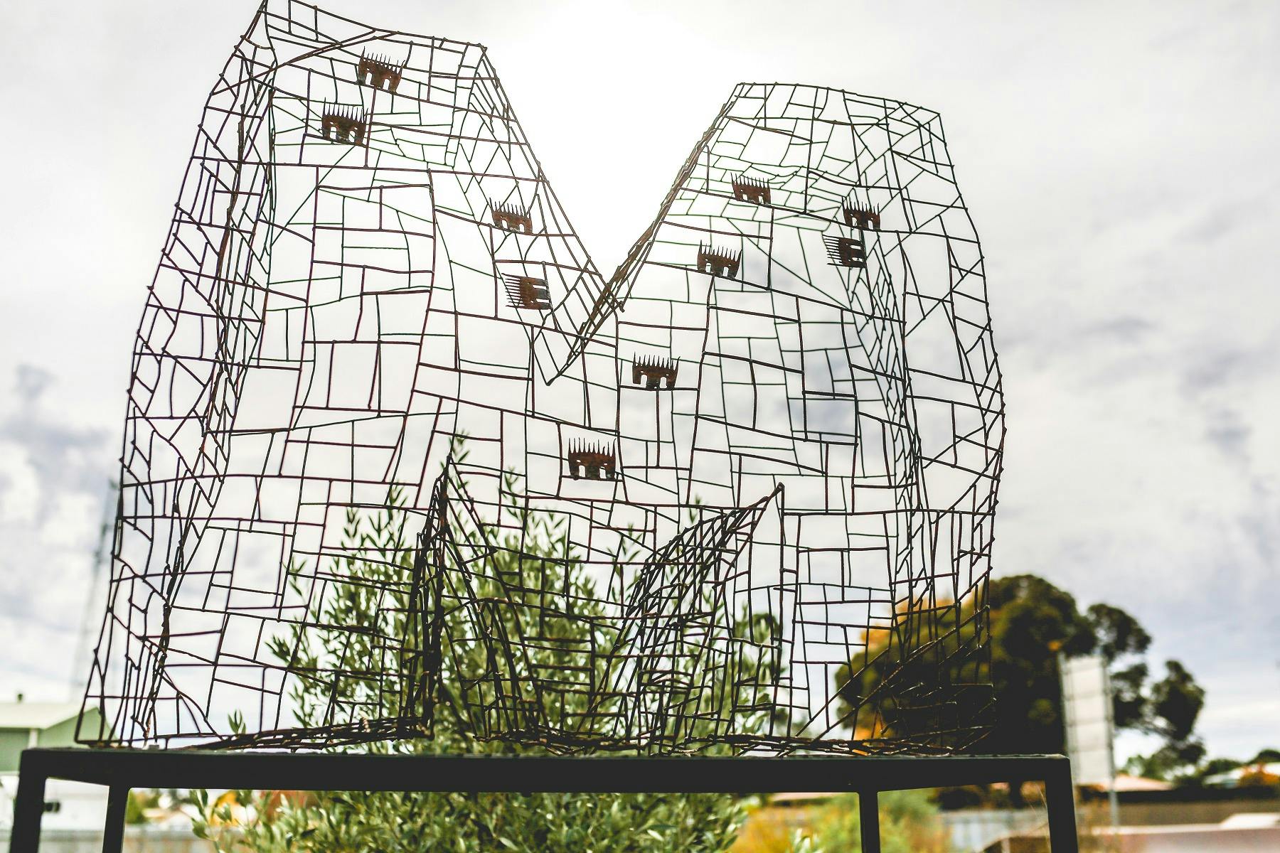 Wire sculpture of the letter M