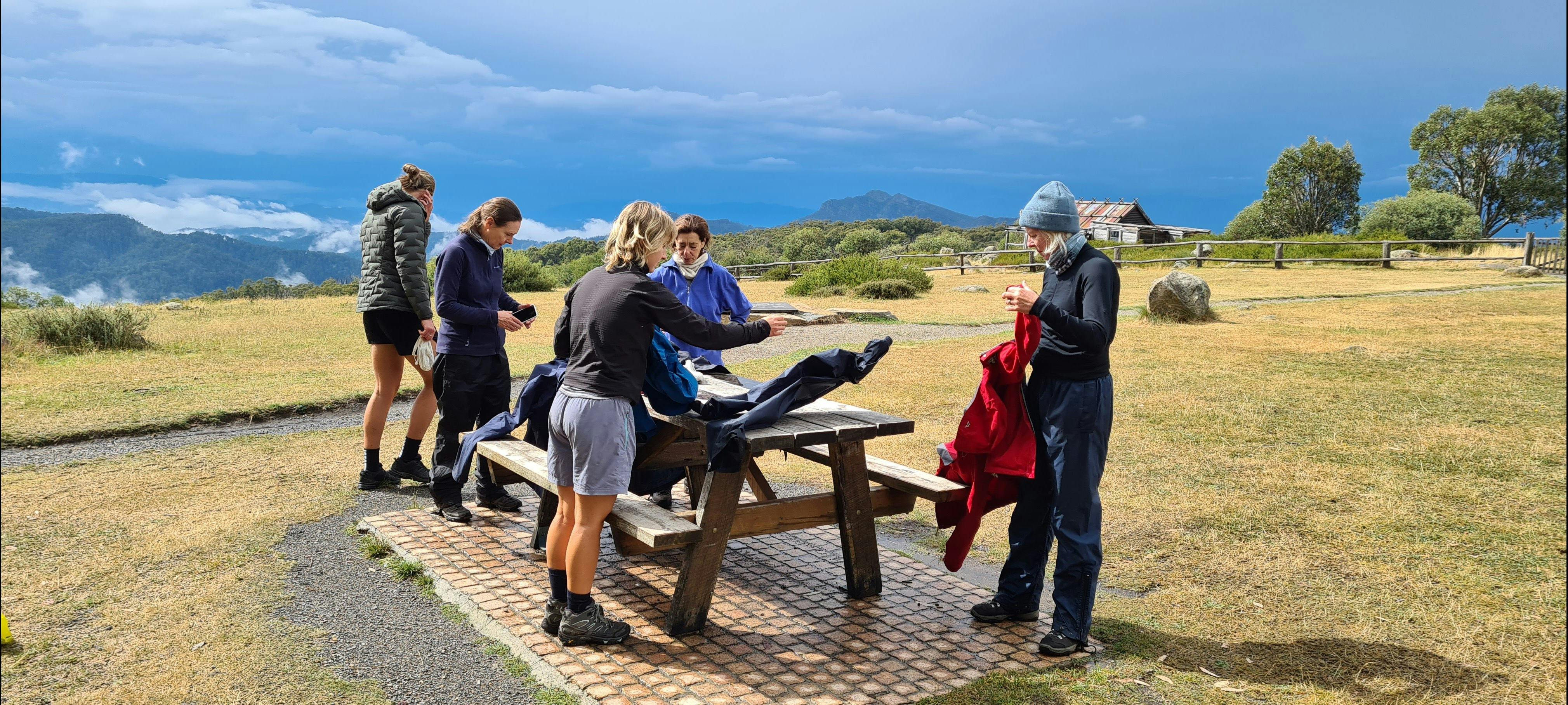 Hikers arrive at Craig's Hut.