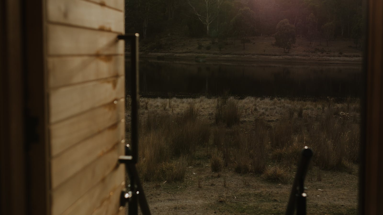 Views across Tasmania's waterways and bushland from the sauna entrance.