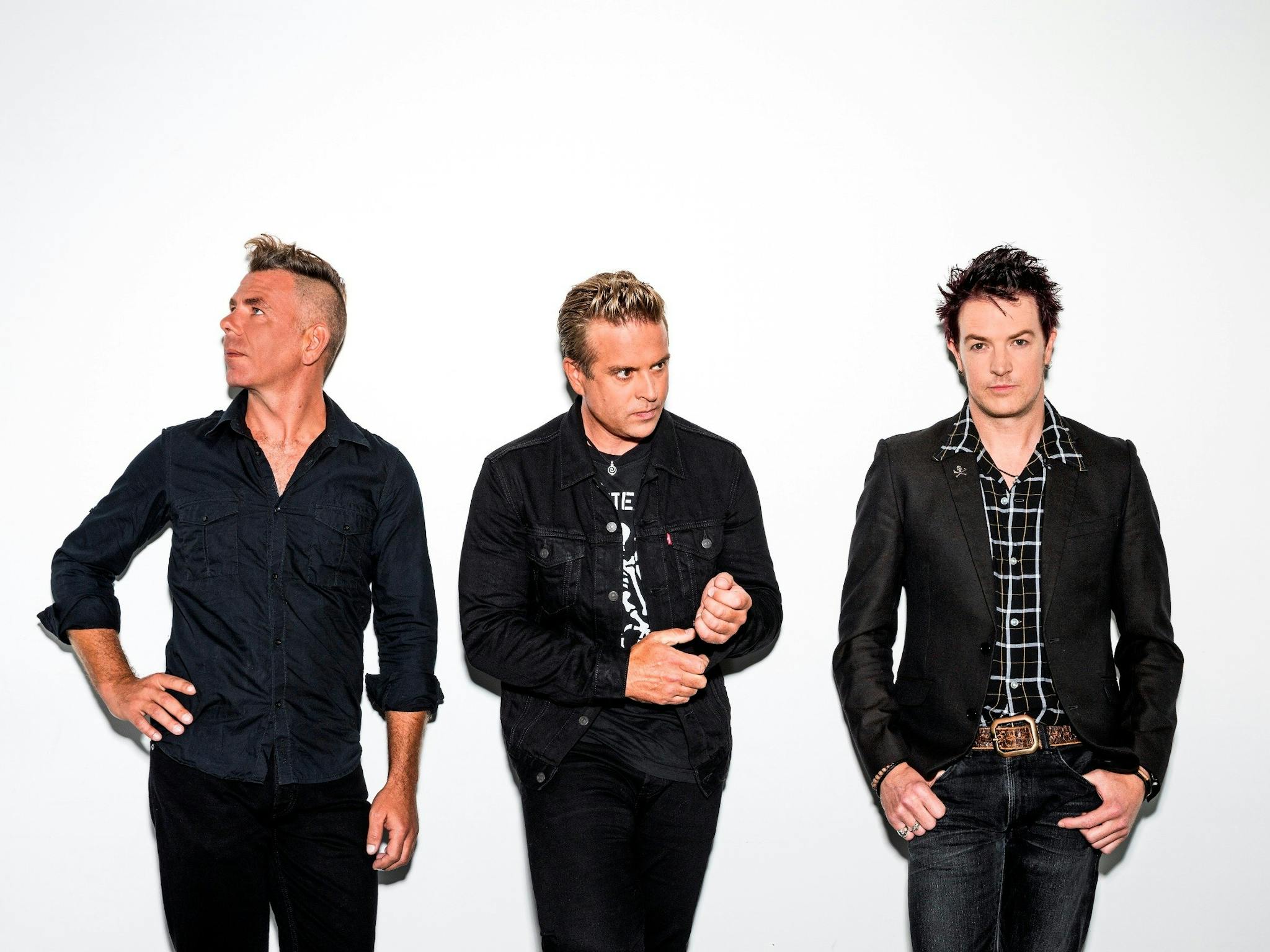 A photo of the band, The Living End