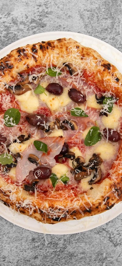 San Marzano Tomatoes, Fior de latte, Double smoke ham, Mushrooms and Olives finish with Oregano