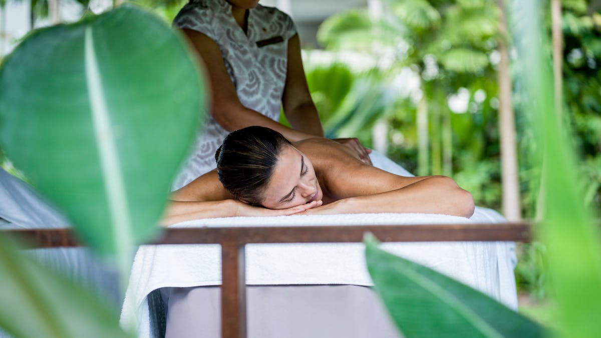 Image of woman getting a massage at InterContinental Hayman Great Barrier Reef Image of woman getting a massage at InterContinental Hayman Great Barrier Reef