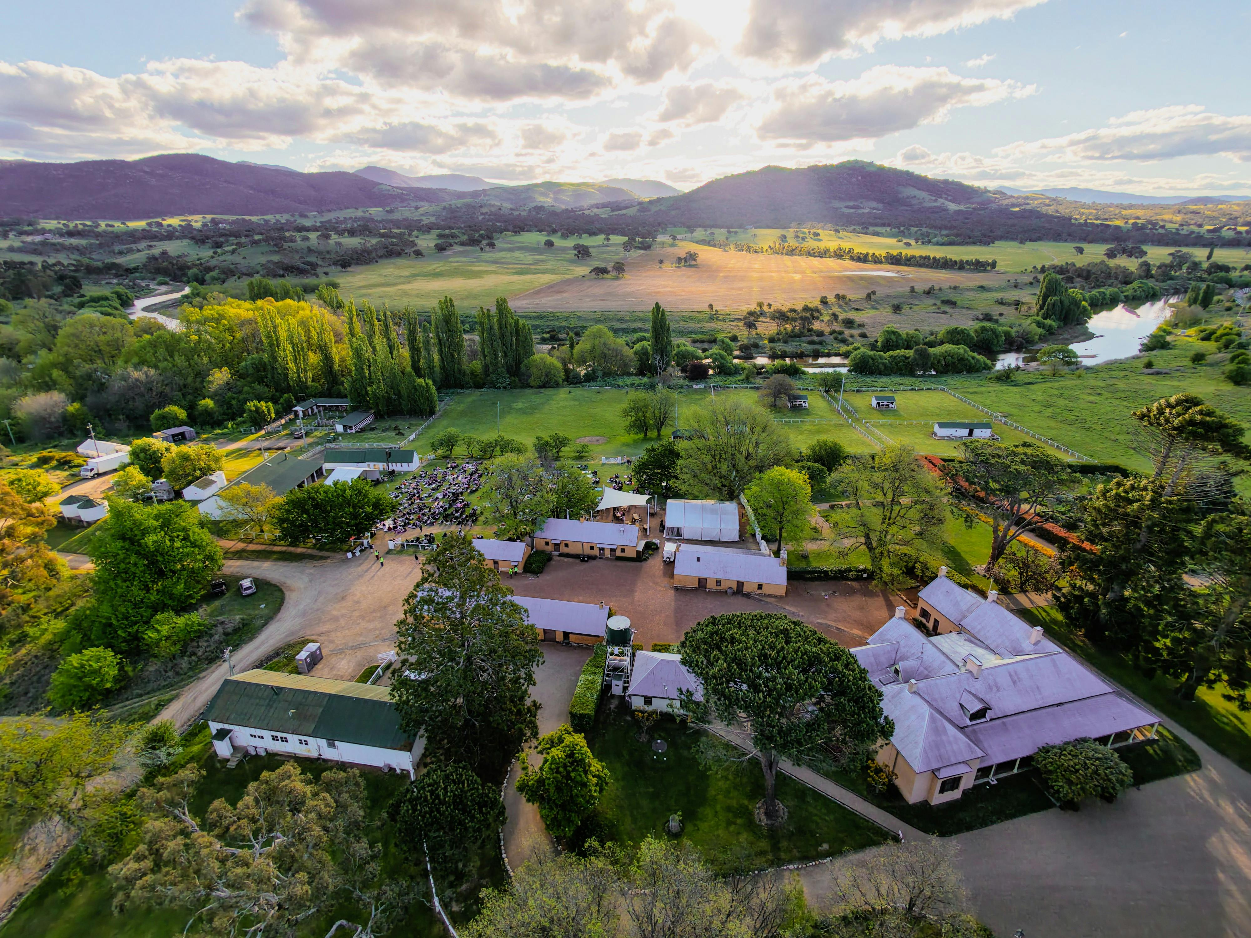 Drone image of Lanyon Homestead towards murrimbidgee river and brindabellas
