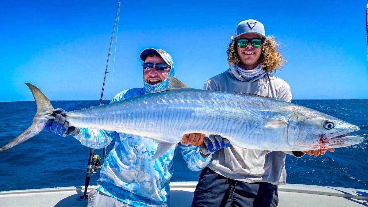 Two guests with fish