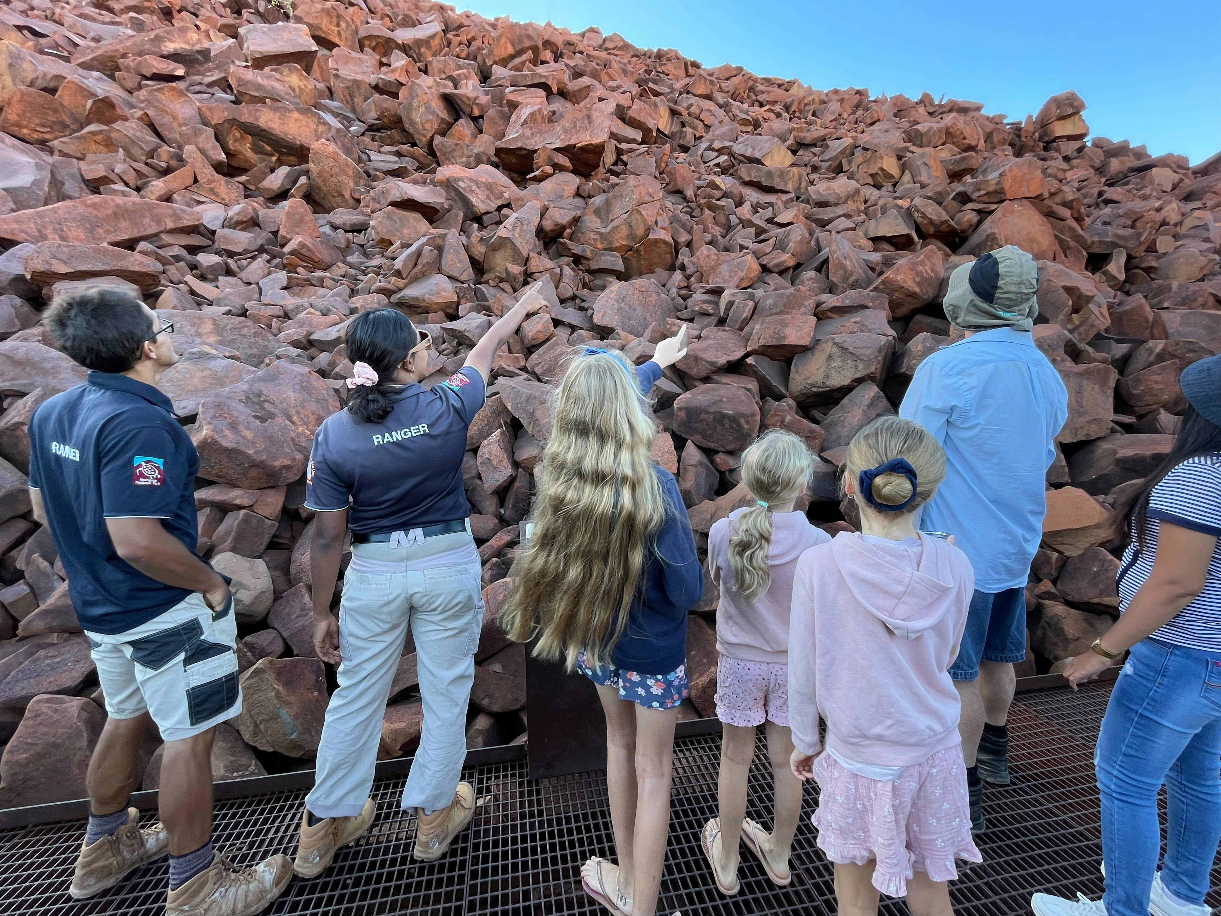 Ranger Sarah conducting a Rock Art tour
