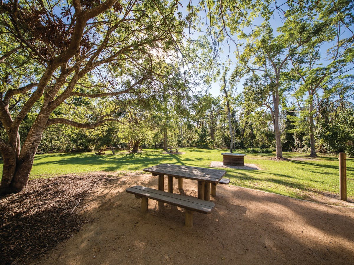 Picnic table in open grassed area