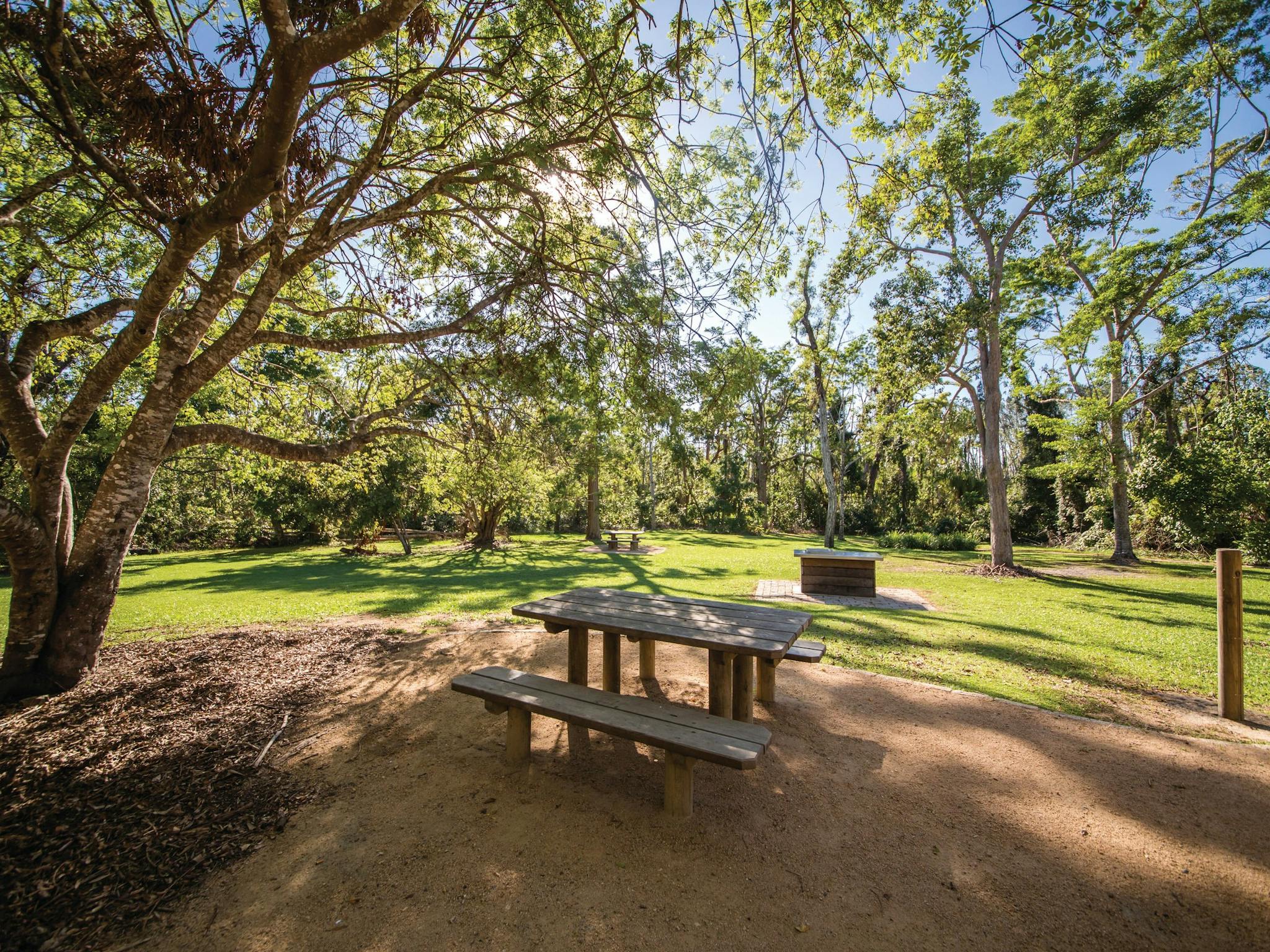 Picnic table in open grassed area Picnic table in open grassed area