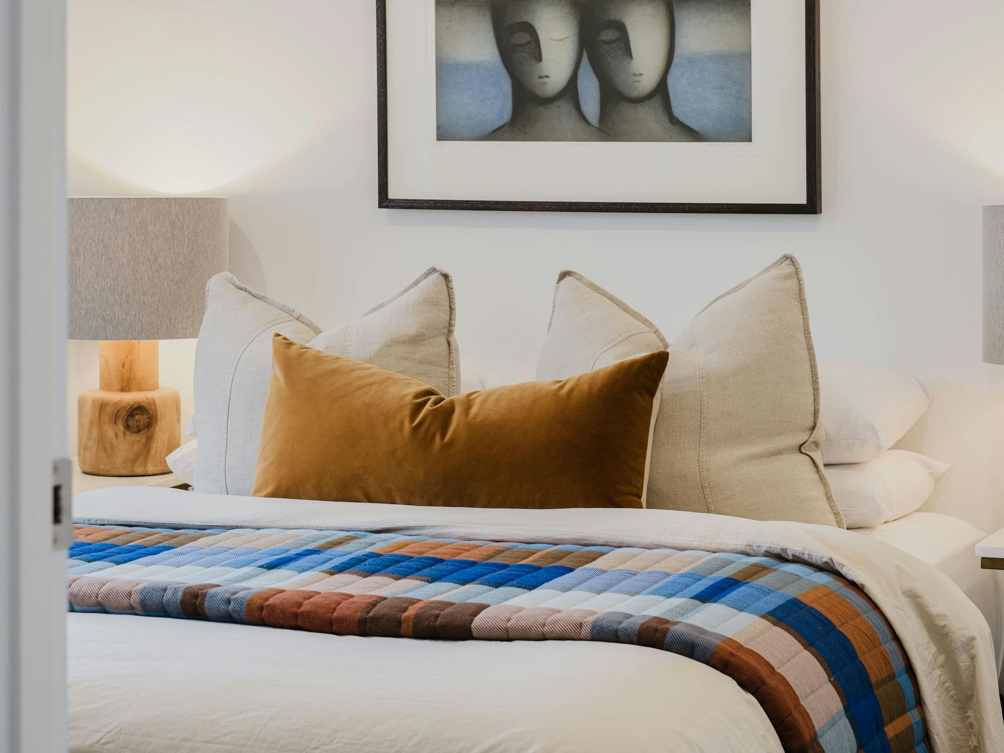 bedroom with lamps on either side