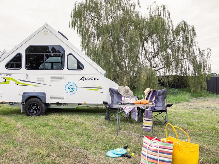 Get away Mini Caravan Hire with camp chairs set up