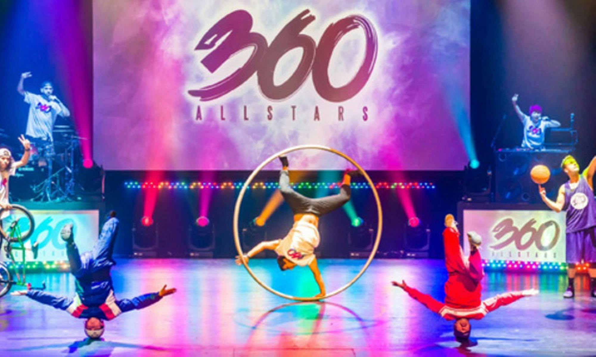 Performers showcasing circus, breakdance, basketball and BMX skills on lit stage