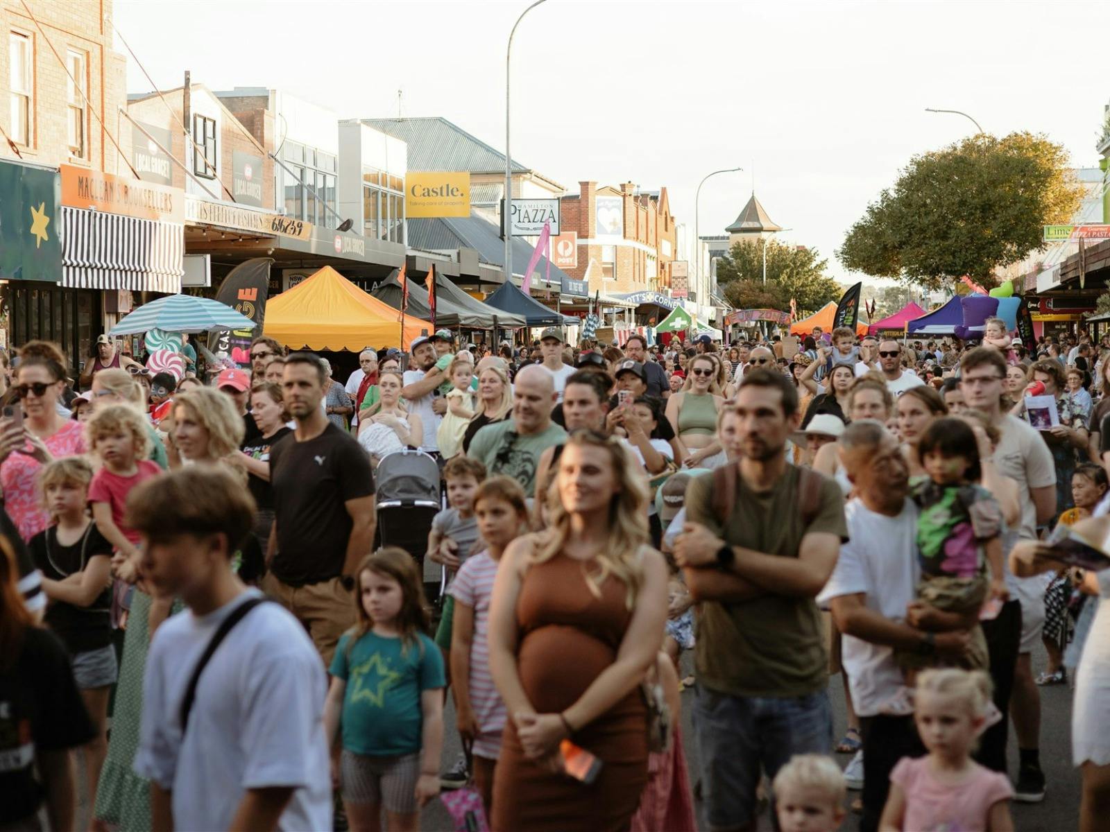Crowd on the street watching a stage