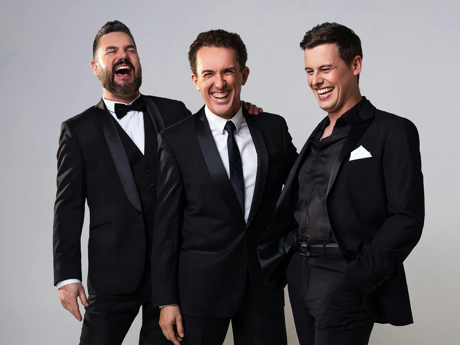 Ben Mingay, Jason Barry Smith, Billy Bourchier standing in group laughing