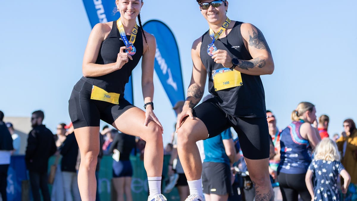 Participants celebrating with medals