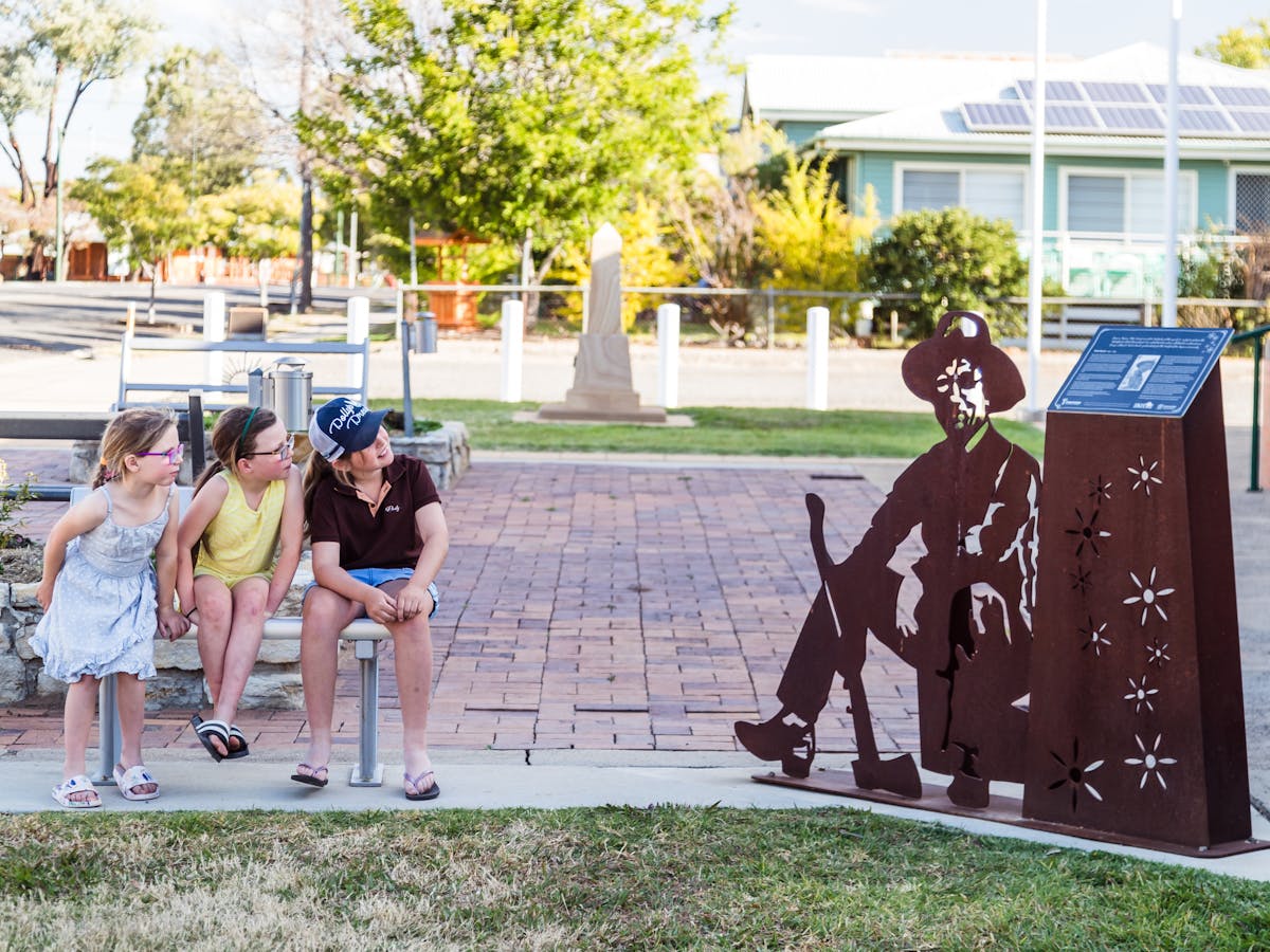 Children enjoying one of the many 'Character's of Injune' sculptures
