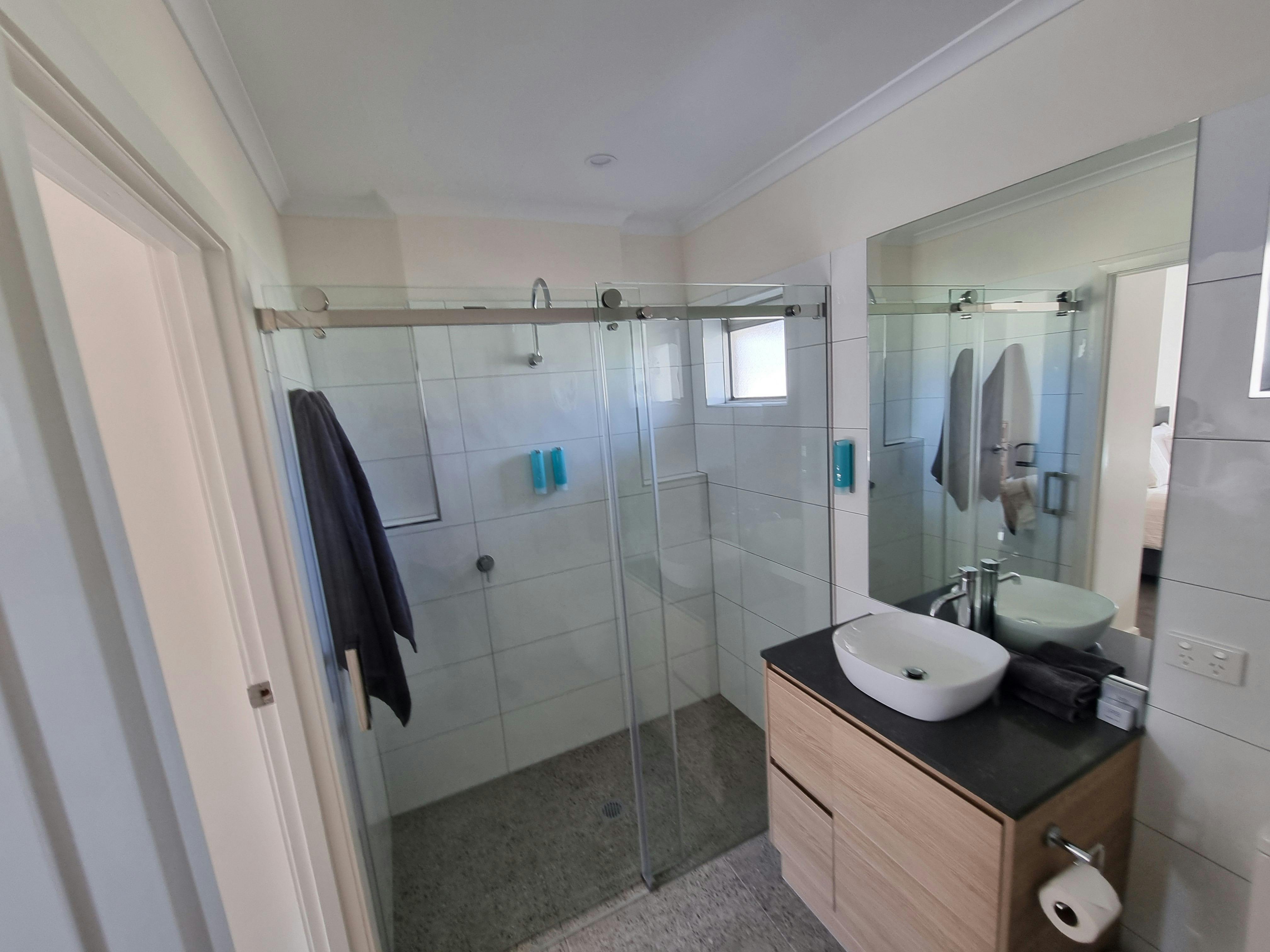 Large shower, vanity, quality towels, toiletries
