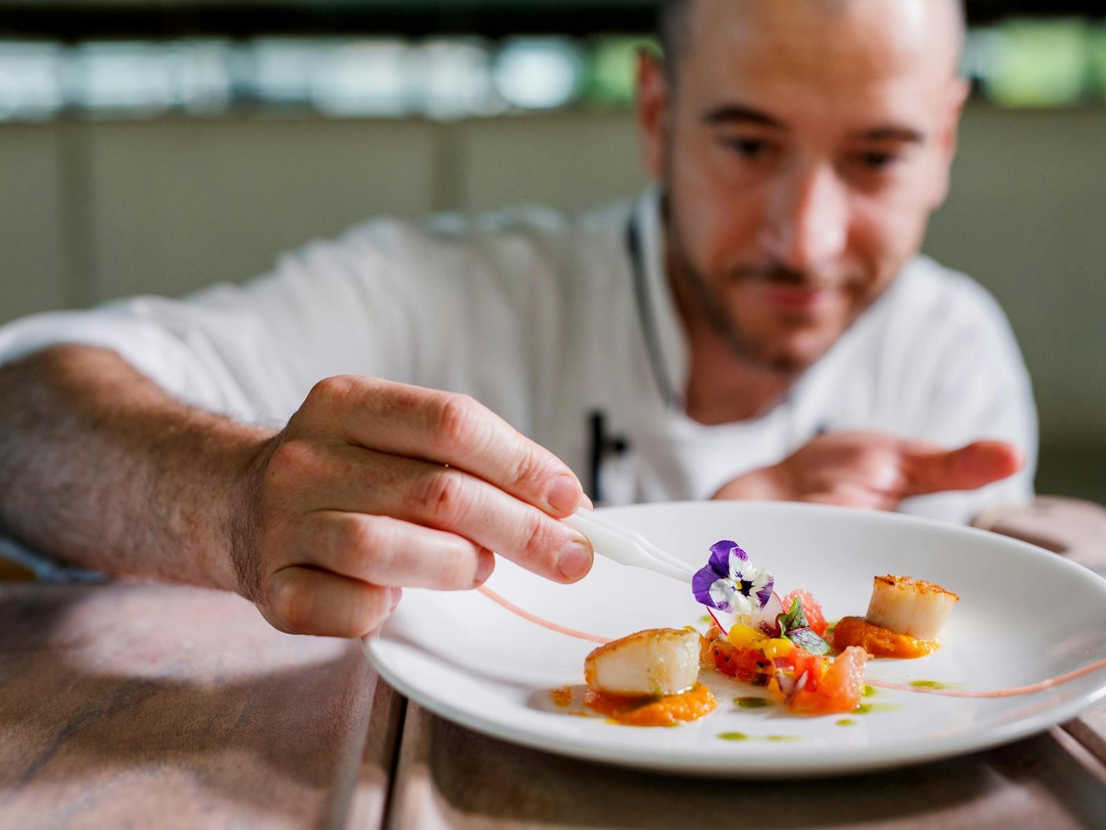 Chef preparing dish