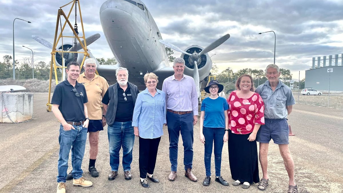 Members in front of Dakota C-47 aircraft with local & State Tourism representatives