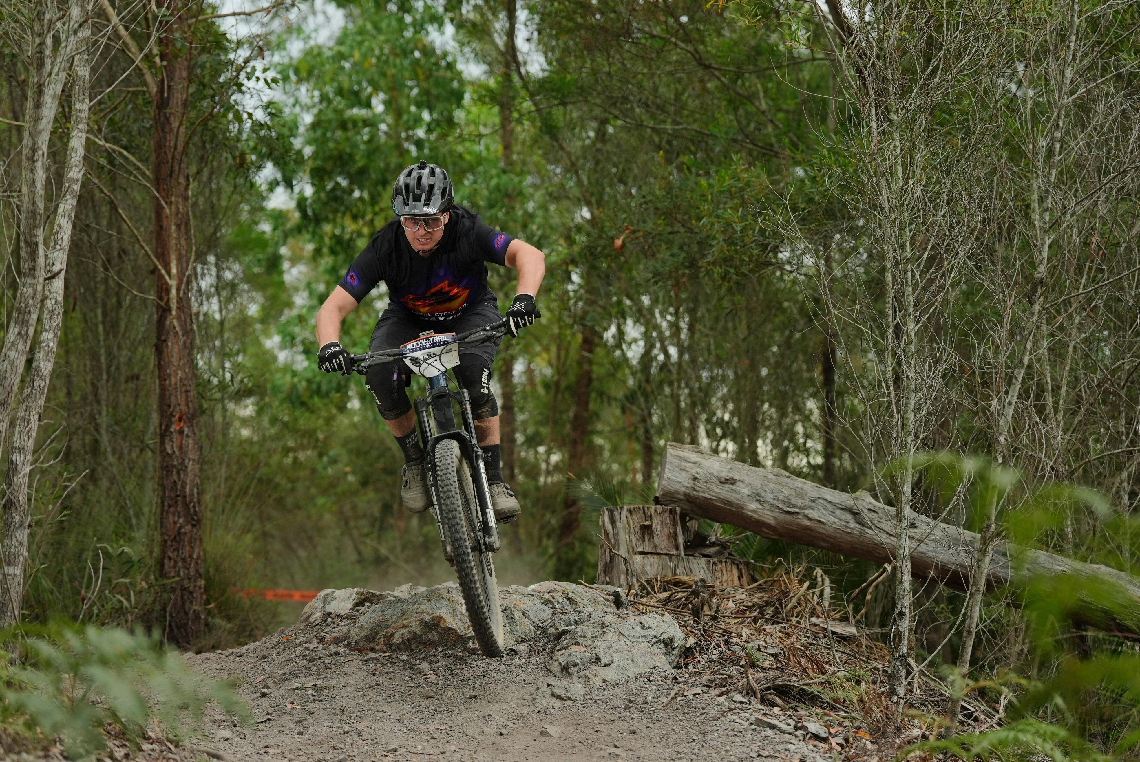 Racer competing on gravity zone trails in Narooma