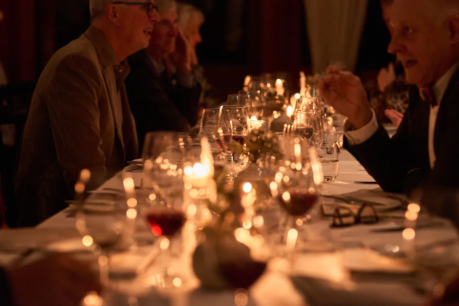 A candlelit dining table at The Long Apron
