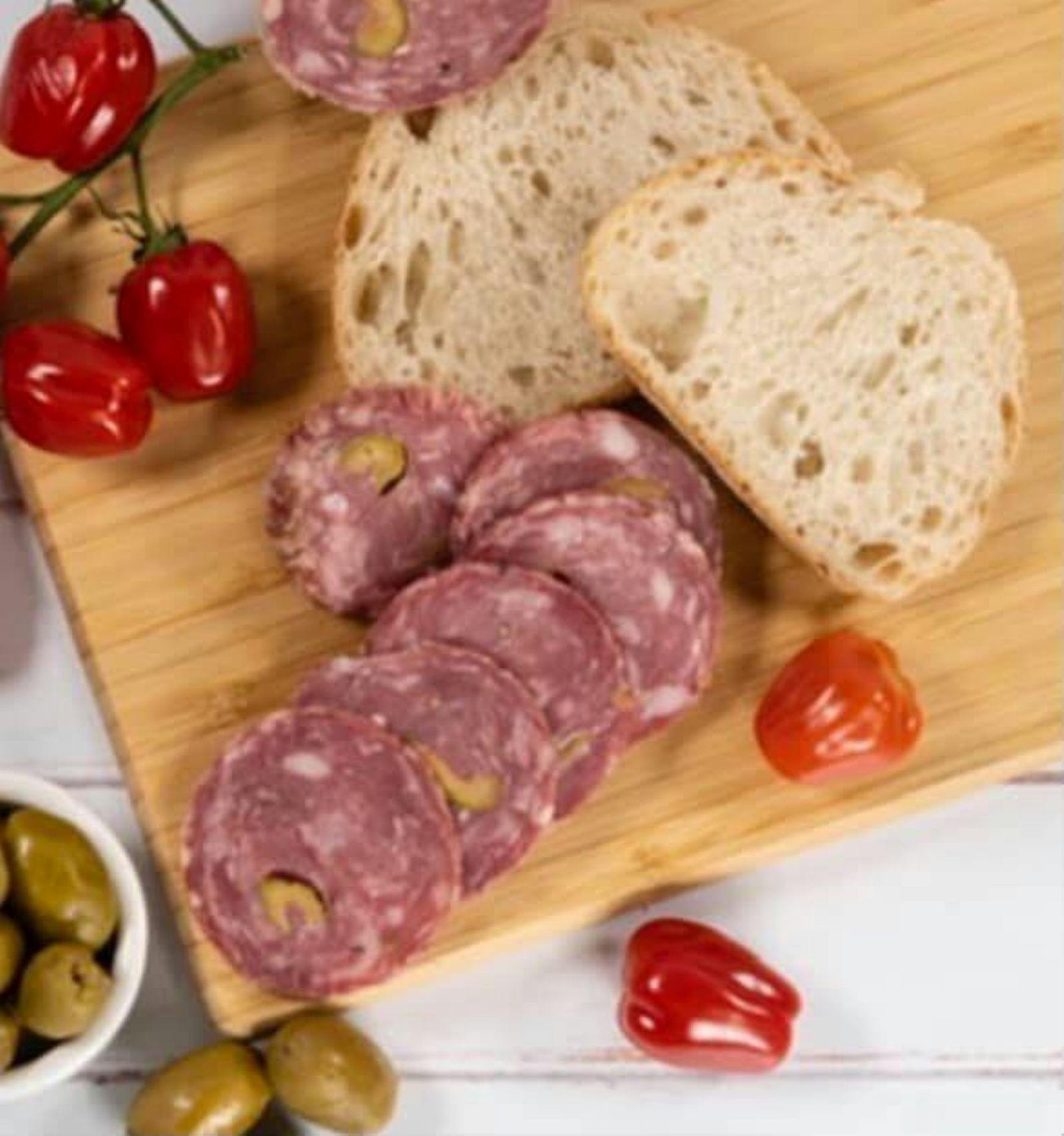 Farmers & Makers Market, The Local Table - bread board with salami, cherry tomatoes and  bread.