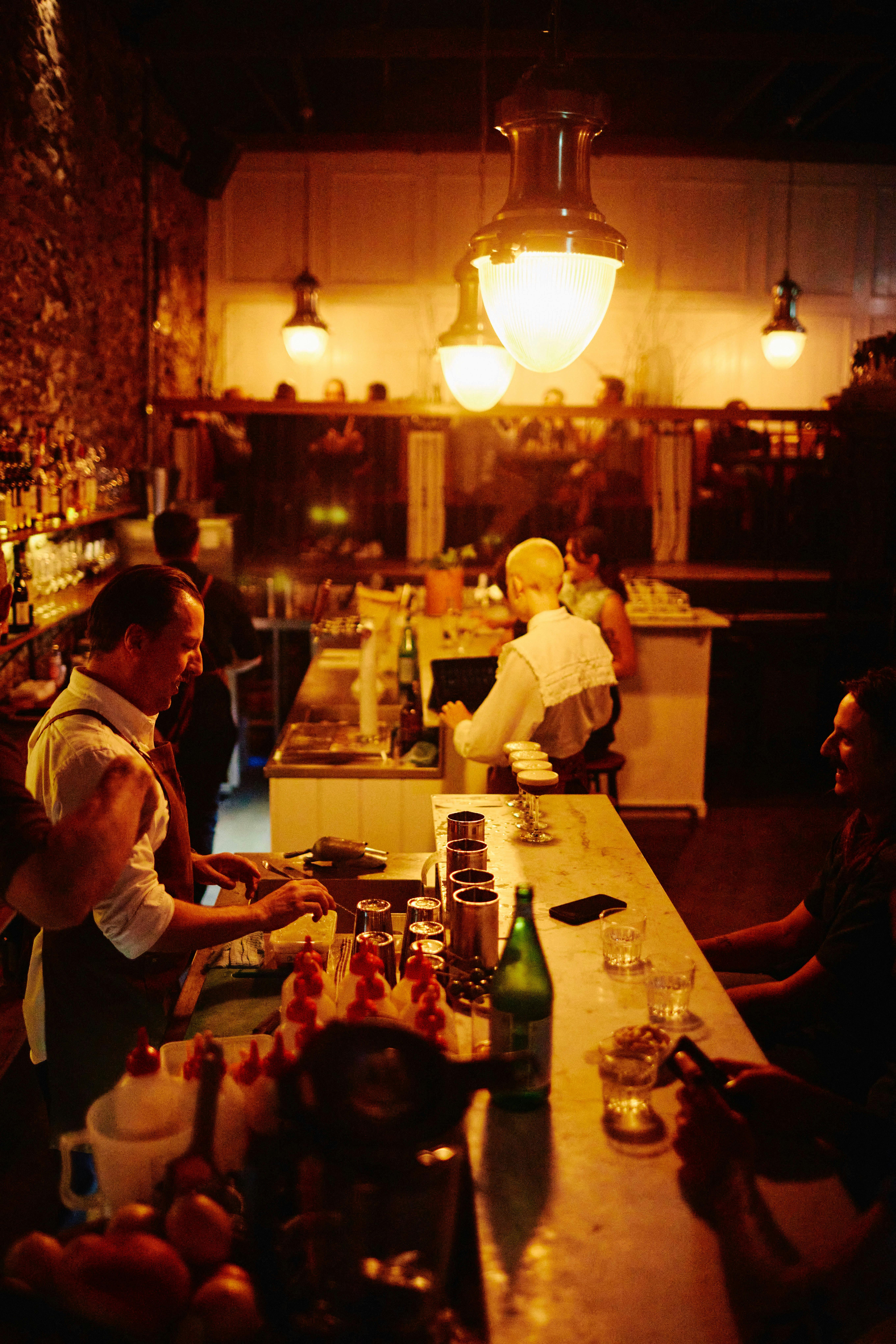 Mixing drinks at the bar