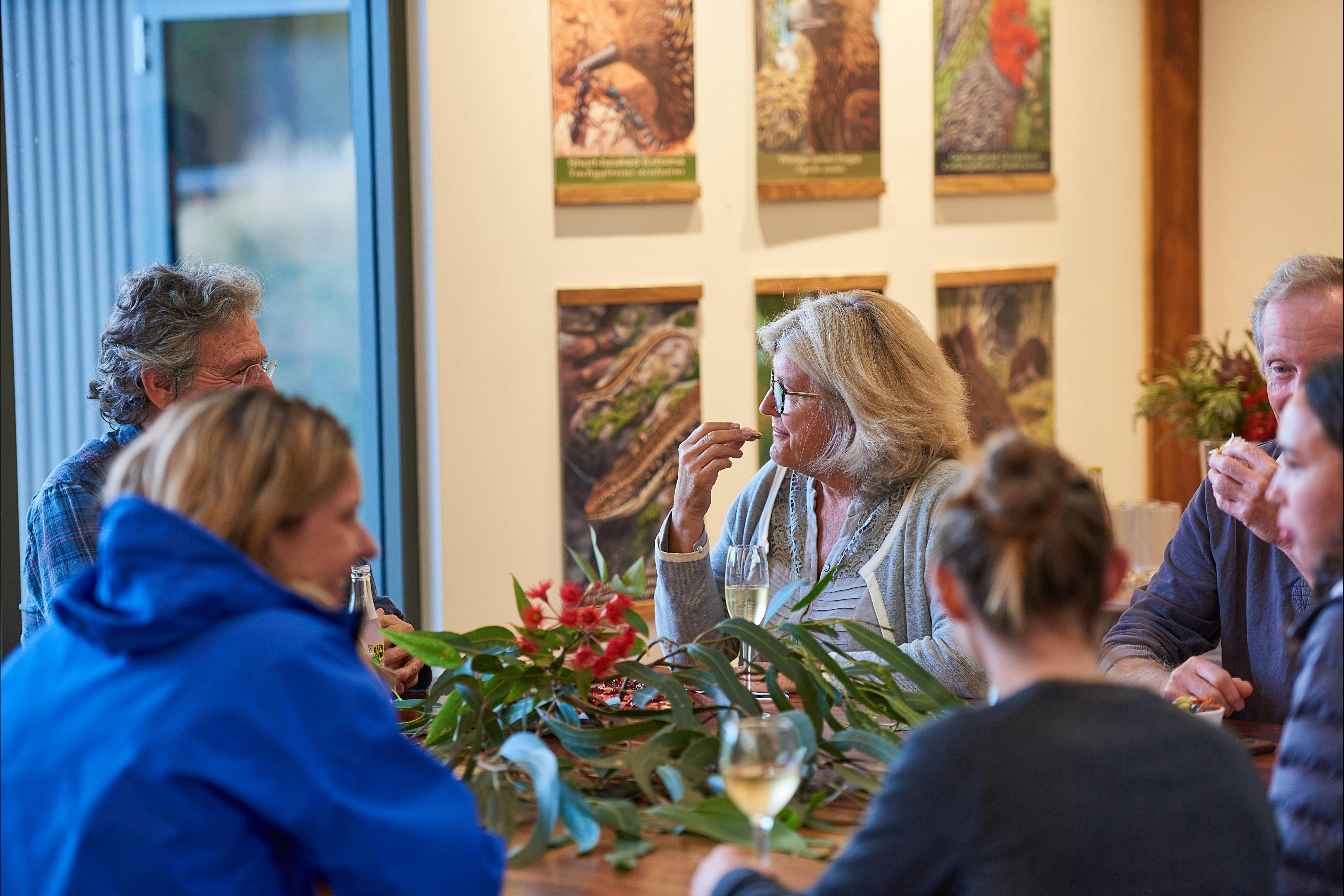 People enjoying food and drink in a relaxing environment