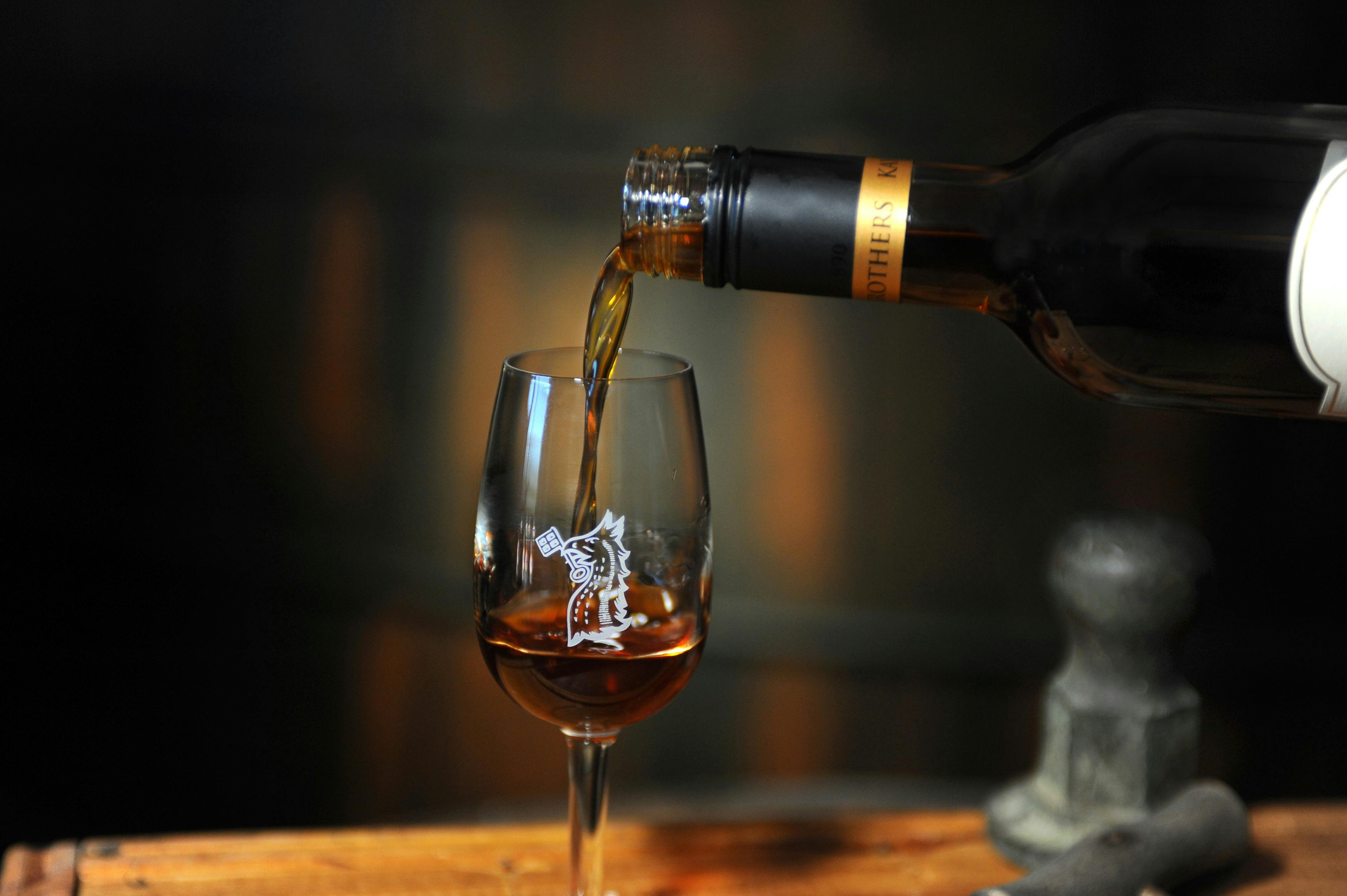 Kay Brothers Wine being poured into a stemmed glass
