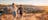 Couple walking down Anzac hill in Alice Springs