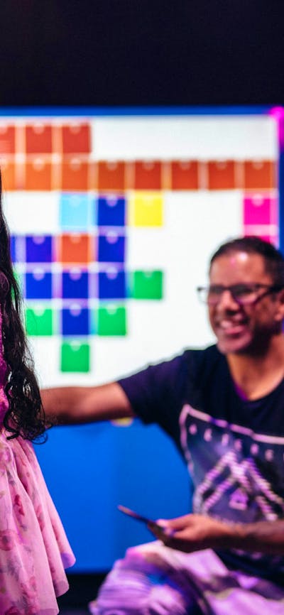 Child enjoying the Illuminate exhibition