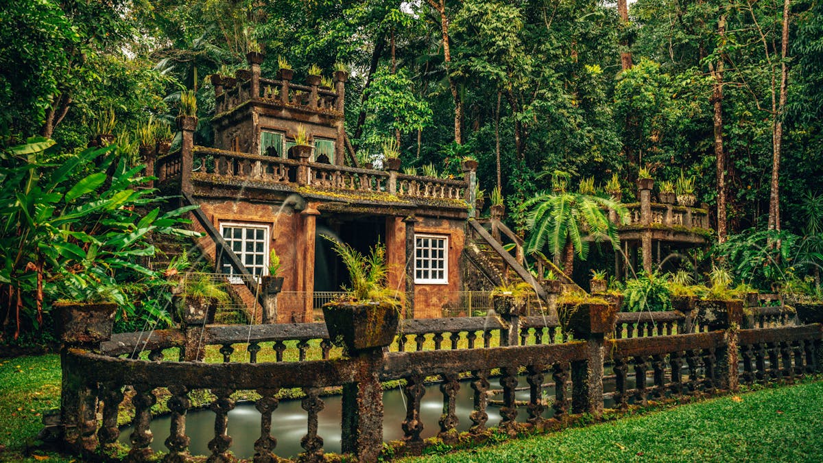 The castle that Jose Paronella built set within the tropical rainforest setting