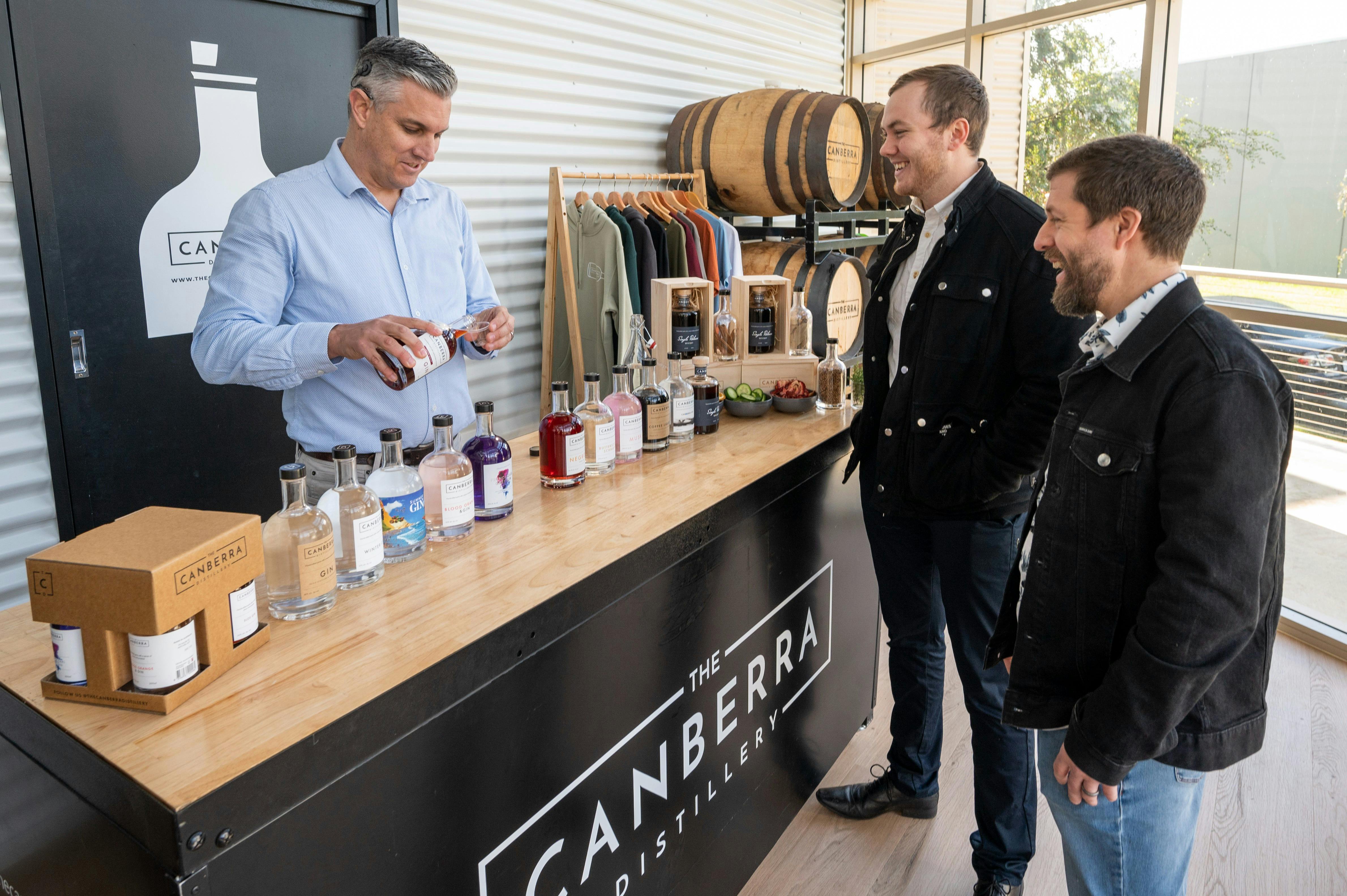 two men do a tasting of gin.