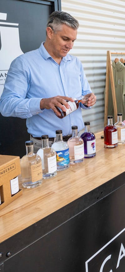 two men do a tasting of gin.