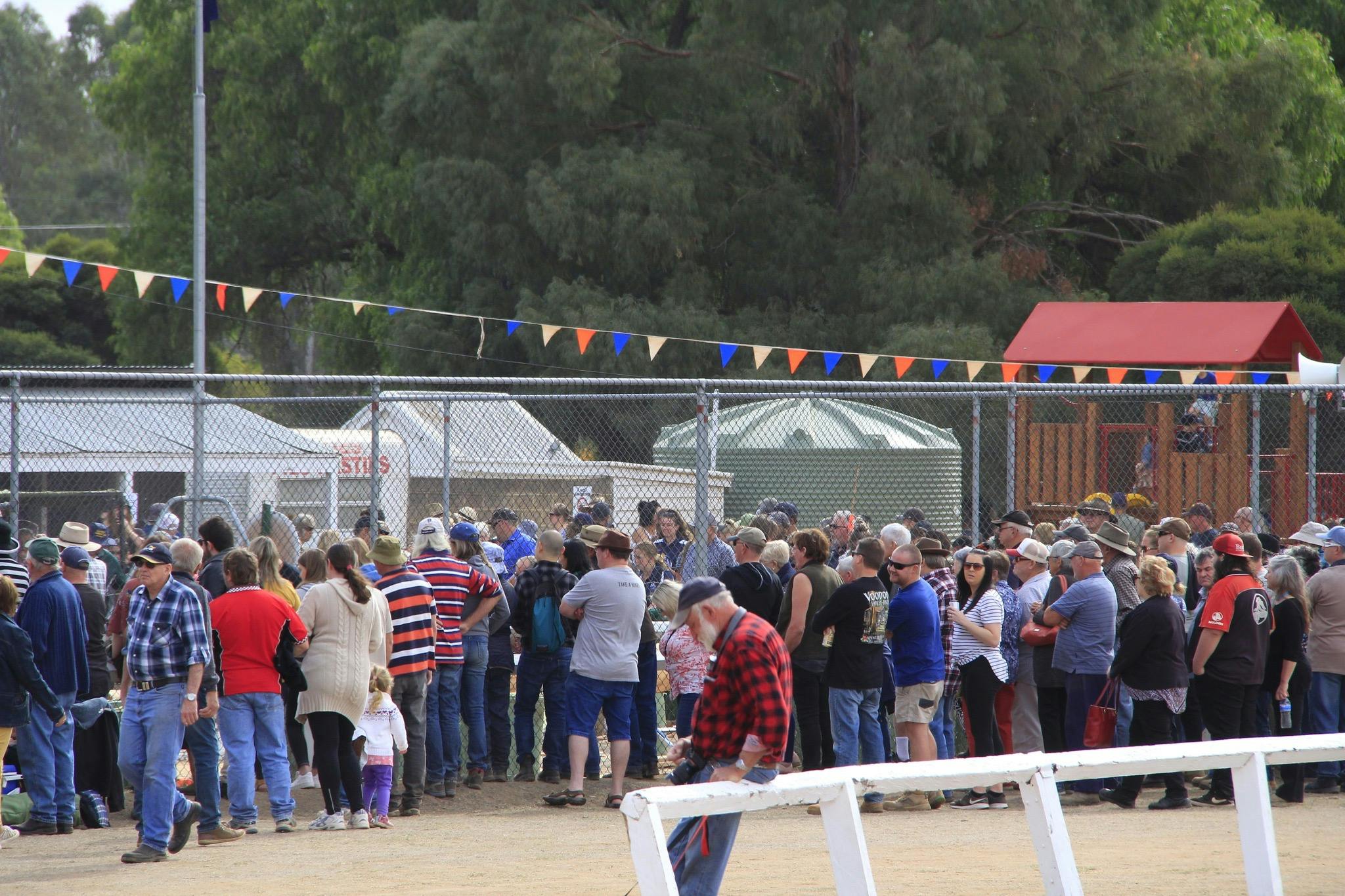 Crowds of people enjoying the atmosphere of the carnival
