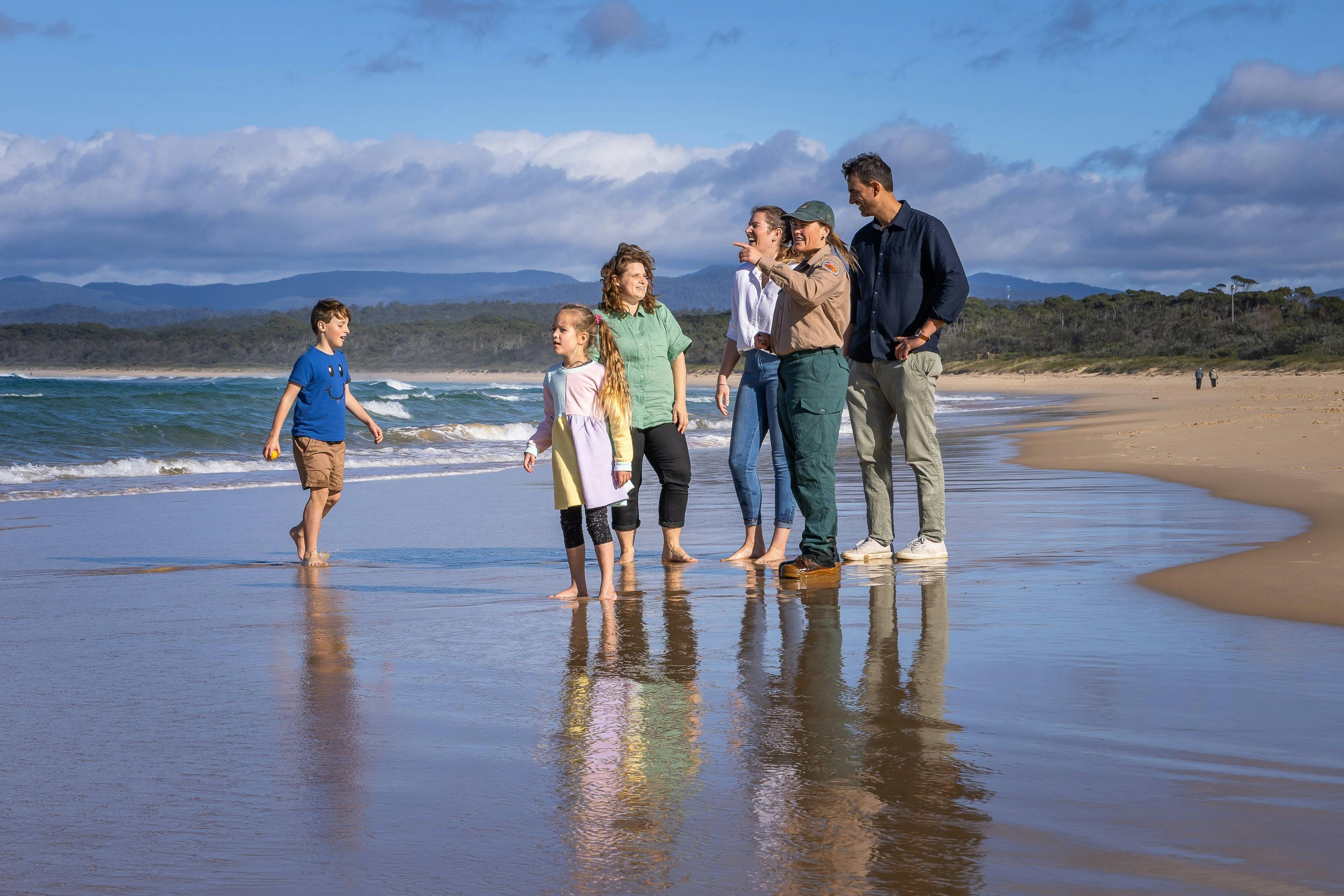 guide with group on beach.