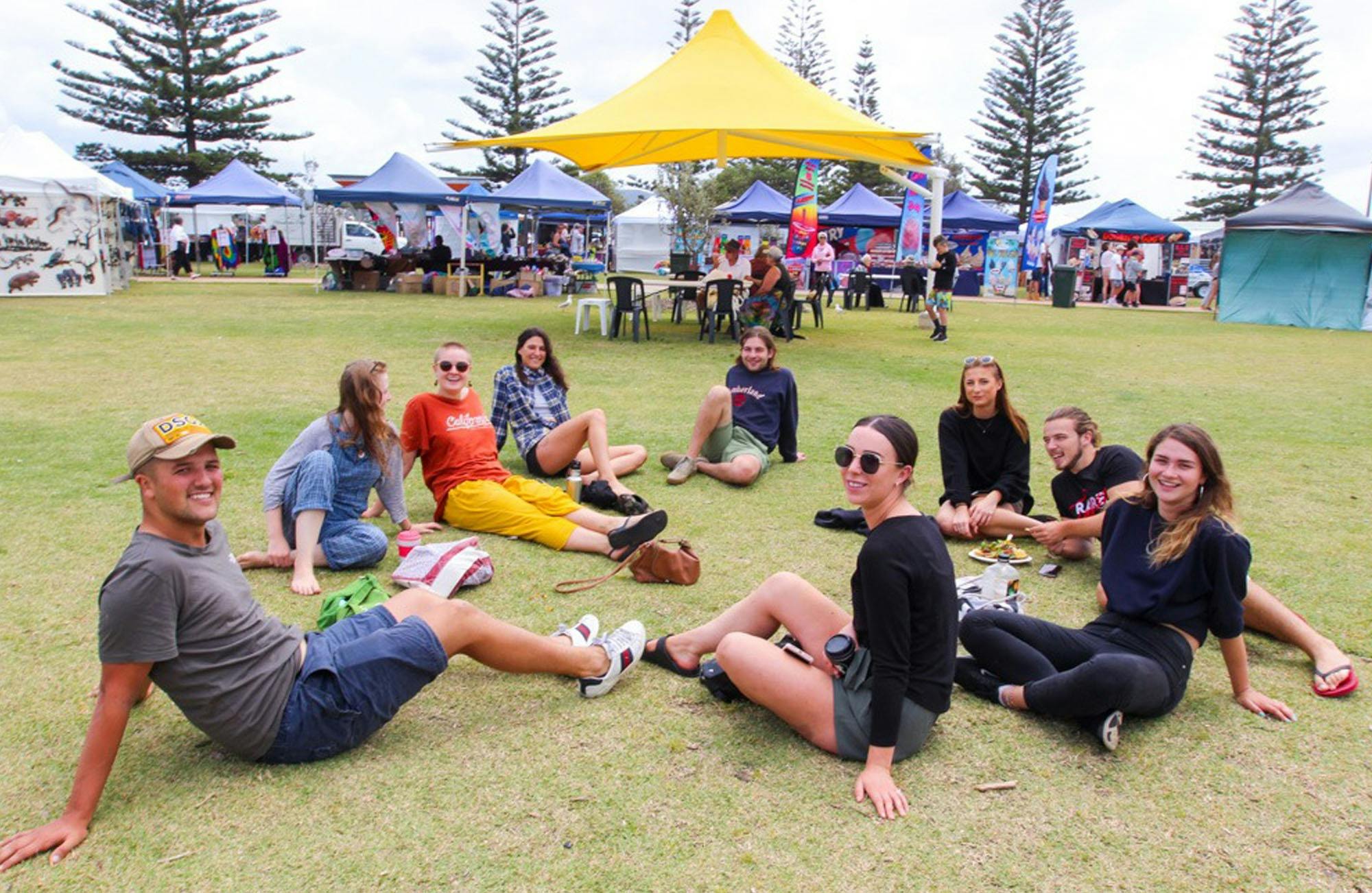 Group of young people relaxing at the market