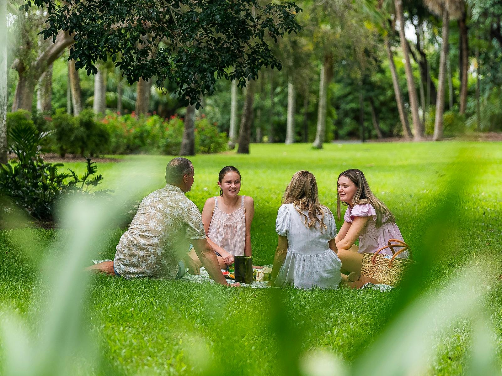 Family enjoys the beautiful surrounds of Rockhampton Botanic Gardens Family enjoys the beautiful surrounds of Rockhampton Botanic Gardens