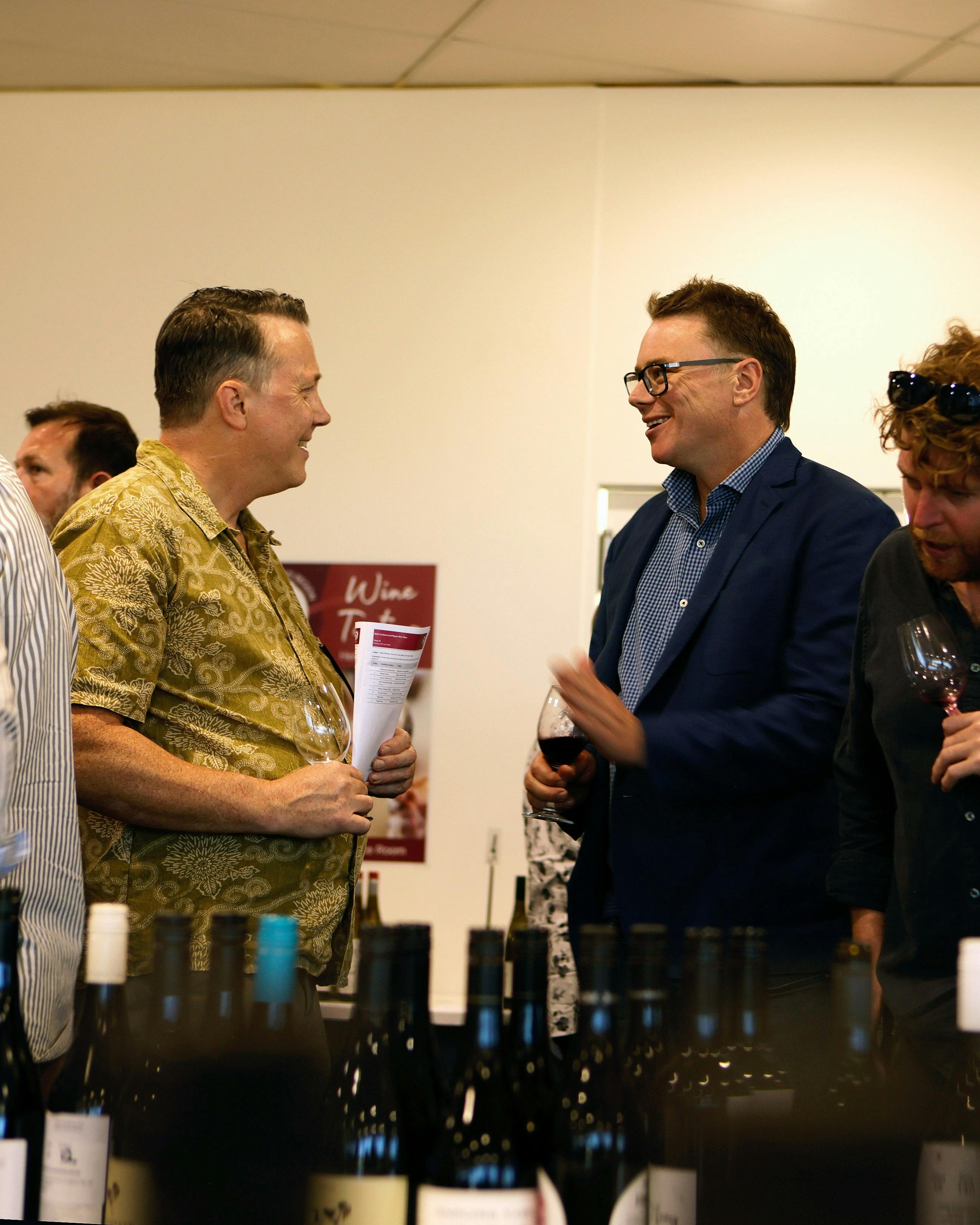 Nick O'Leary talking to a wine taster