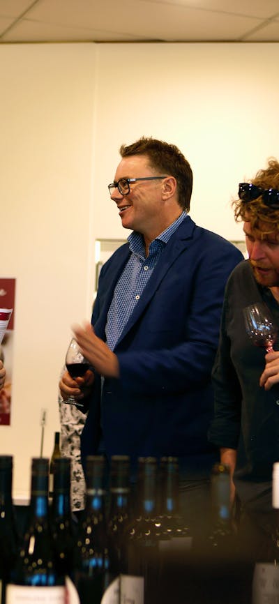 Nick O'Leary talking to a wine taster
