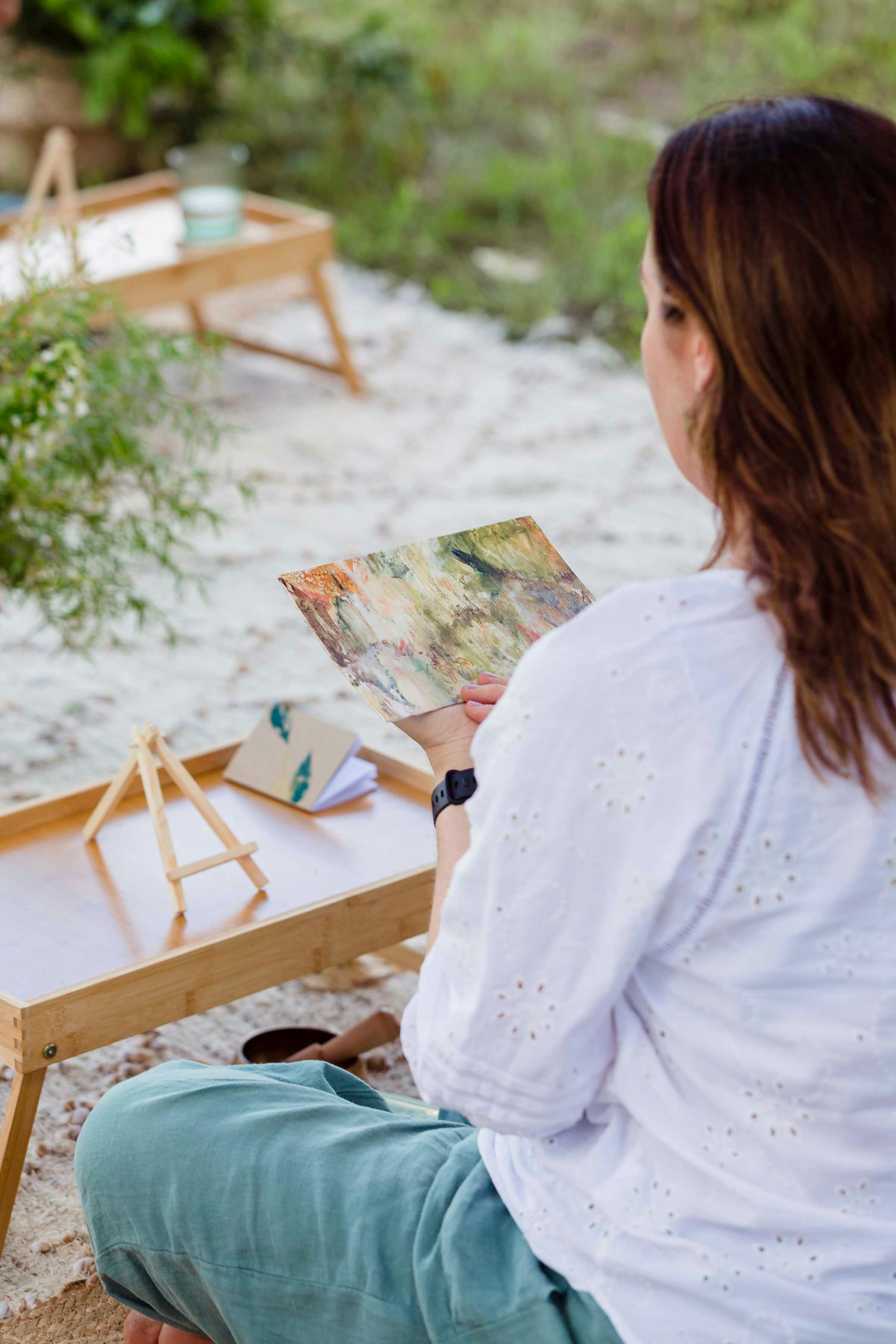 Woman looking at artwork