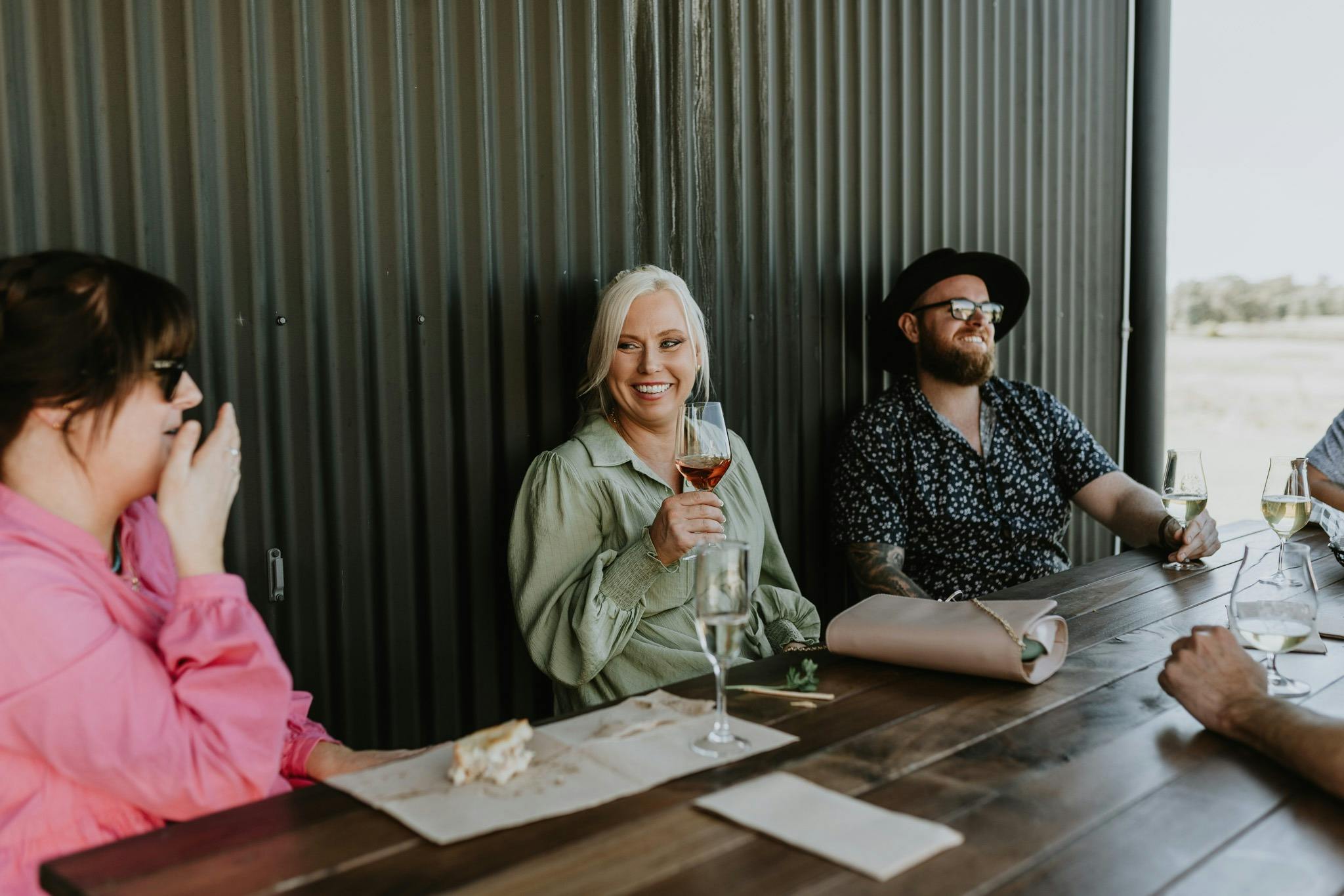 Mudgee Ale Trail clients relaxing at a brewery whilst having a drink