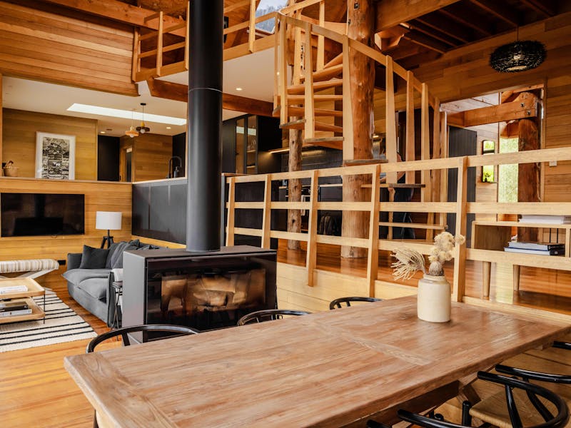 Lounge and dining space with dual sided fireplace