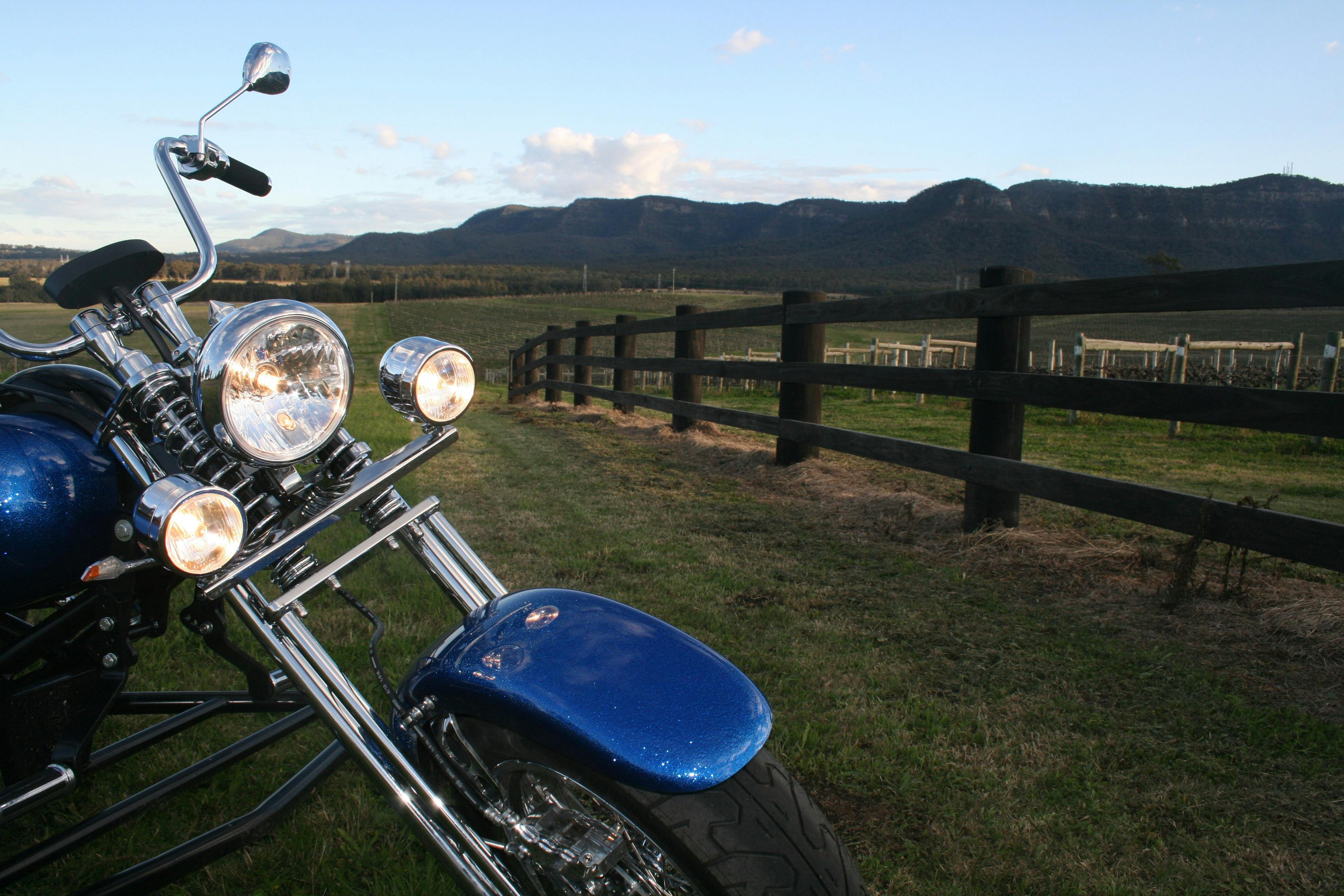 Trike and fence at sunset stop
