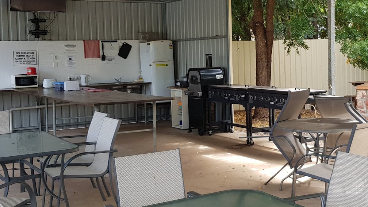 Covered Camp Kitchen with a BBQ area and HD Television