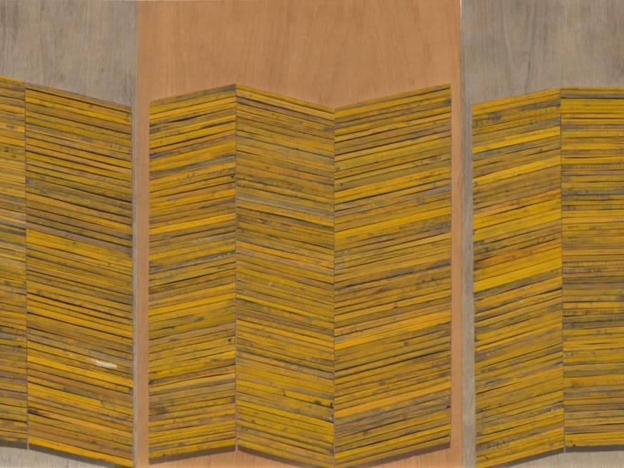 Painted and stencilled sawn or split wood from soft-drink boxes, on weathered plywood panels.